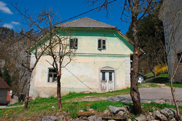 An old derelict building in the Slovenian village of Predjama
