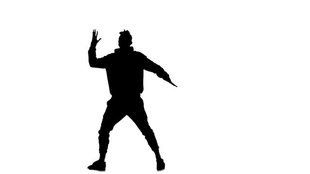 black silhouette on a white background, young energetic guy vigorously dancing hip hop, freestyle, street dance, performs complex movements, slow motion