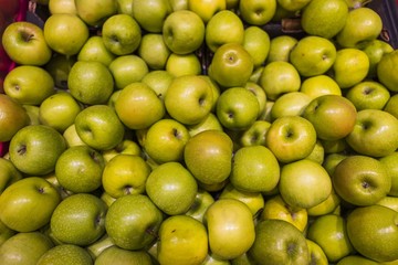 Close up macro view of green apples. Healthy food concept. Beautiful nature fruits background.