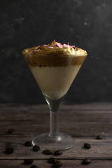 Dalgona coffee - Instant coffee or espresso powder whipped with sugar and hot water, Iced whipped dalgona coffee concept..