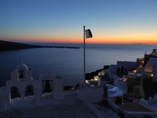 sunset in oia santorini greece