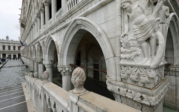 detail of Angle of Ducal Palace in Venice during high tide