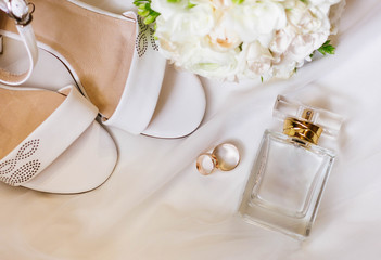 Wedding shoes and wedding paraphernalia, wedding gold rings, wedding bouquet