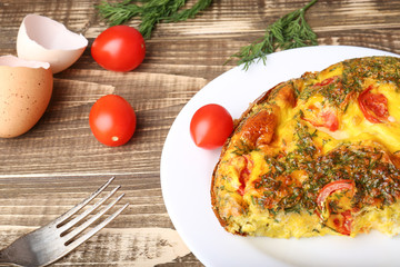 Omelet with vegetables close-up