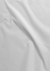 Glued paper for poster texture. Blank white crumpled and wrinkled paper template for background. Matted wet paper wrinkled for mockup posters