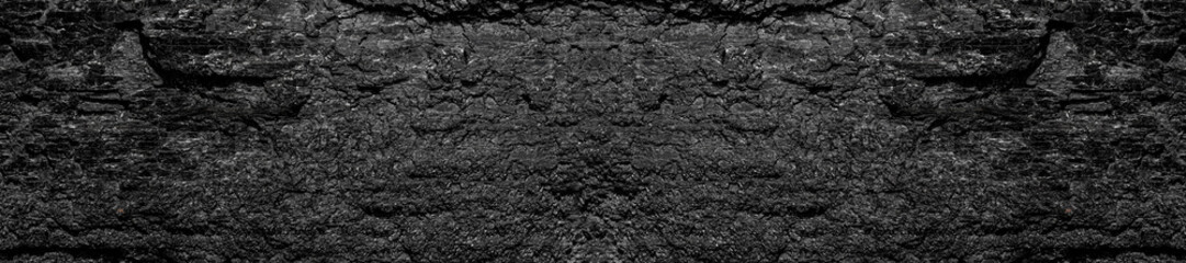 Panorama dark texture of black color.