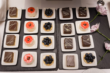Set of beautiful (delicious) cakes in the restaurant