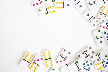 Board game dominoes, children's game, on a white background, isolate. Domino effect shot. business concept, strategy of success