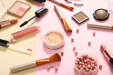 Set of decorative cosmetics on a colored background