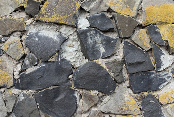 Surface of stone wall. Texture of stone masonry.