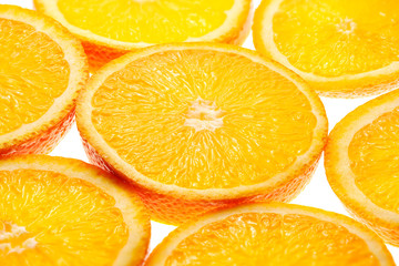 Fresh sliced orange fruit isolated on white background