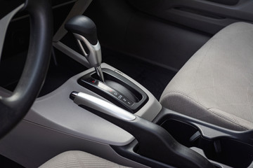 automatic transmission shift lever. Auto interior. Car engine.