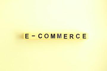 e-commerce, inscription on yellow cubes,