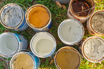 Empty paint cans at the curb for recycle pick-up