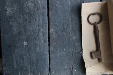Old key on a vintage table