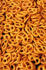 Delicious pretzels with salt on the table