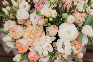 large flower arrangement in a big white hat box was created by a florist for a wedding gift. White...