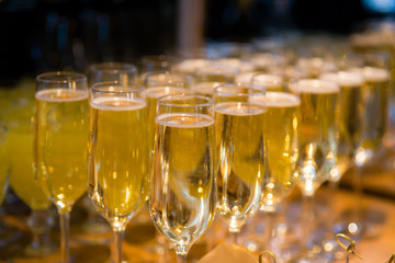 Glasses of champagne on the table