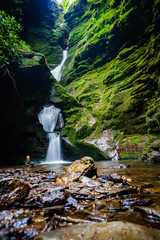 Small waterfall in St. Nectan’s glen in Cornwall, UK