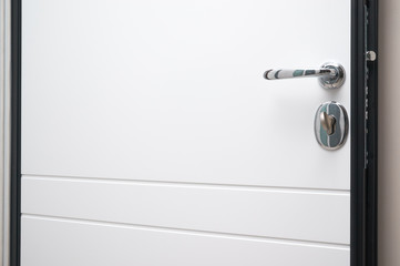 open steel lock on the back of the front door