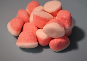 Different types of candy that give a beautiful color to the image.