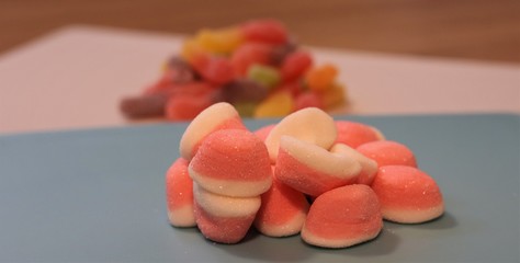 Different types of candy that give a beautiful color to the image.