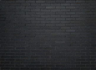 Fototapeta na wymiar Background, texture gray, black brick wall. Dark brick wall for wallpaper