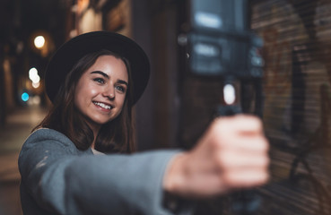 Traveler female blogger shooting video for shoot social media with digital camera. Smiling  woman...