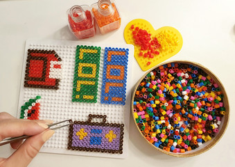 playing with plastic beads, hobby fun and art ideas, DIY home  kids play 
