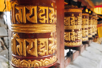 Traditional Ornate Tibetan prayer wheel in Pangboche monastery, Khumbu Valley, Nepal.