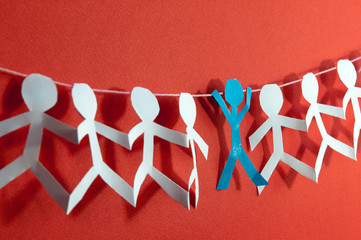 Human paper cut figures in a row. Diversity and teamwork concept