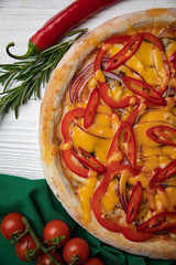 Italian pizza on white wooden background