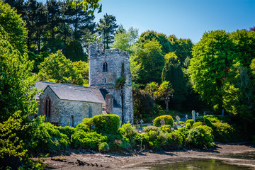 Old church and graveyard of St. Just in Roseland, Cornwall, UK