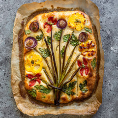 Flower focaccia Creative idea of focaccia cooking. Crispy focaccia with vegetables. Healthy food...