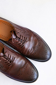 brown men shoes. classic fashion shoes on white background