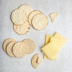 Variety of different Healthy Gluten Free Snacks such as oatcakes, sea salt and pepper crackers, rice crispbreads