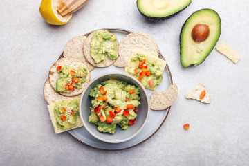 Healthy Gluten Free Snacks. Oatcakes and sea salt crackers with avocado and bell pepper mash. Ideal snack for vegans
