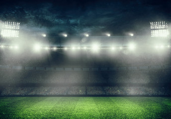 Football stadium with the stands full of fans waiting for the night game. 3D rendering © alphaspirit