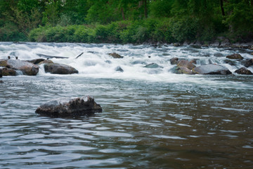 White working water over boulder waterfall