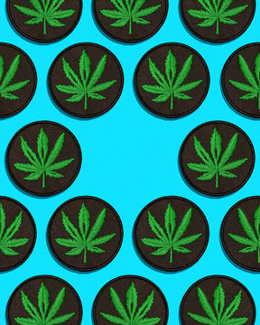 Cannabis Leaf Black Patch in Grid Pattern on Blue Background Center Empty