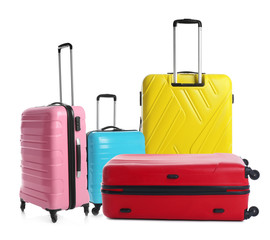 Set of different stylish suitcases for travelling on white background