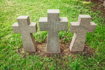 Three stone crosses in the cemetery of German prisoners of war- Wehrmacht army solders in the second world war. Kiev, Ukraine