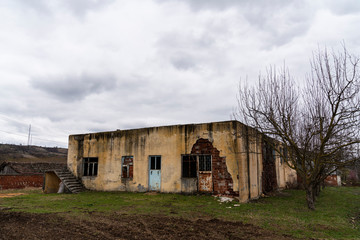 Fototapeta na wymiar Abandoned building, outside view, ruin
