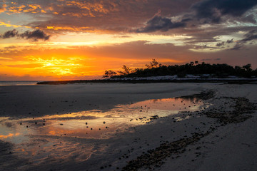 Fototapeta na wymiar sunset by the a Bahamas beach