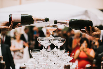 photo of champagne glasses pyramid in a party © wideeyes