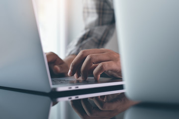 Working on laptop computer