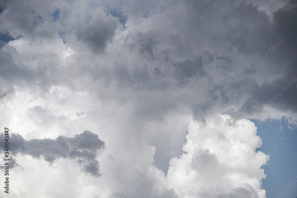 Wall mural terrible thunderclouds from the side of a plane. gloomy epic clouds. background image in a dark gray