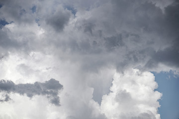 Terrible thunderclouds from the side of a plane. Gloomy epic clouds. Background image in a dark...
