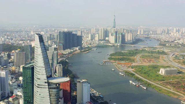 HOCHIMINH, VIETNAM - APRIL, 2020: Aerial panorama view of the Bitexco business center and other buildings at downtown.