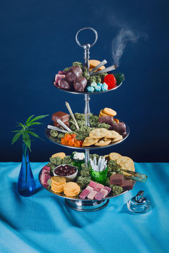 Fancy Tower of Cannabis Edibles with Leaves in Vase and Joints Smoking